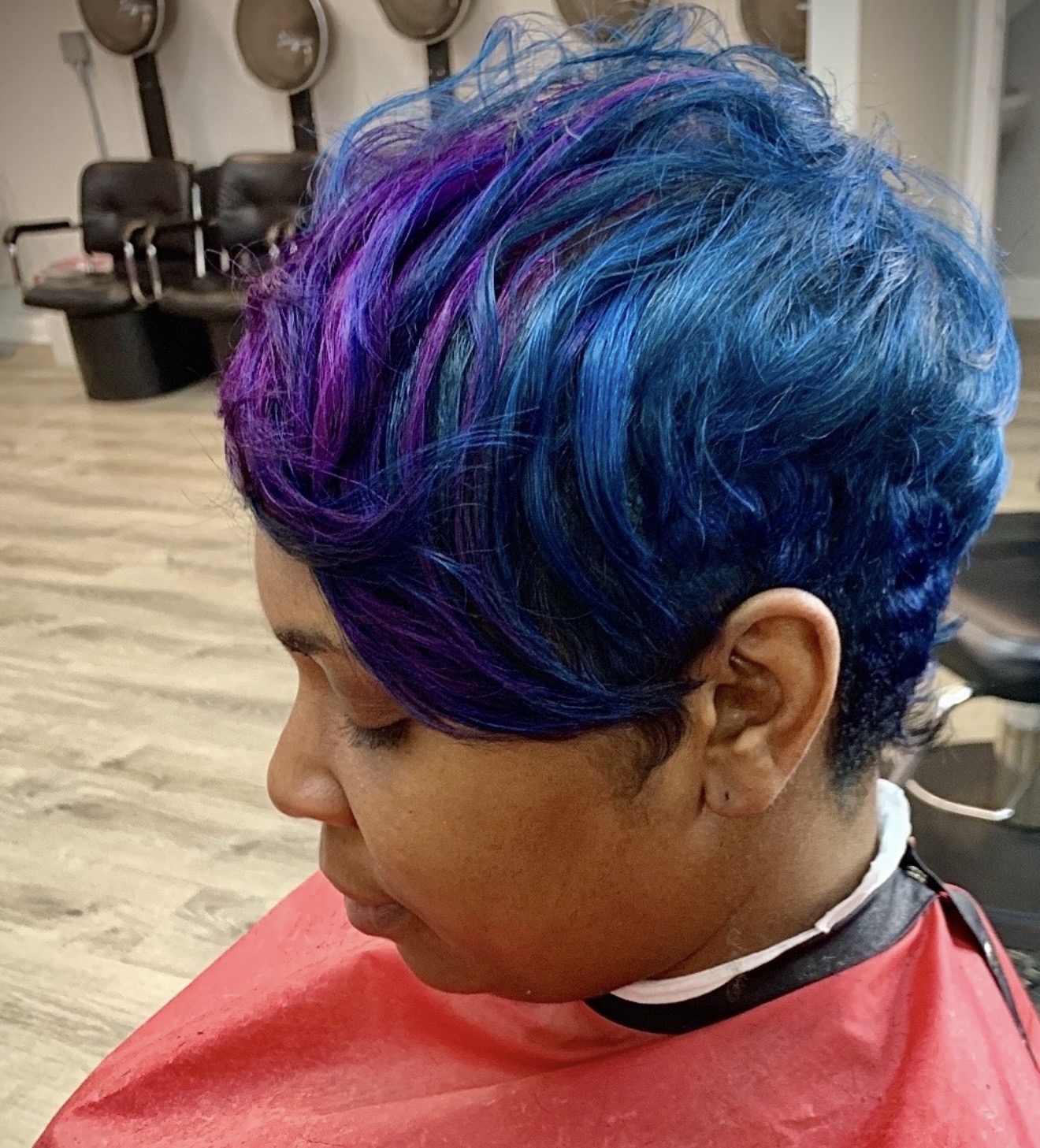 Blue and purple dimensional hairstyle by Genetik Bleu Salon