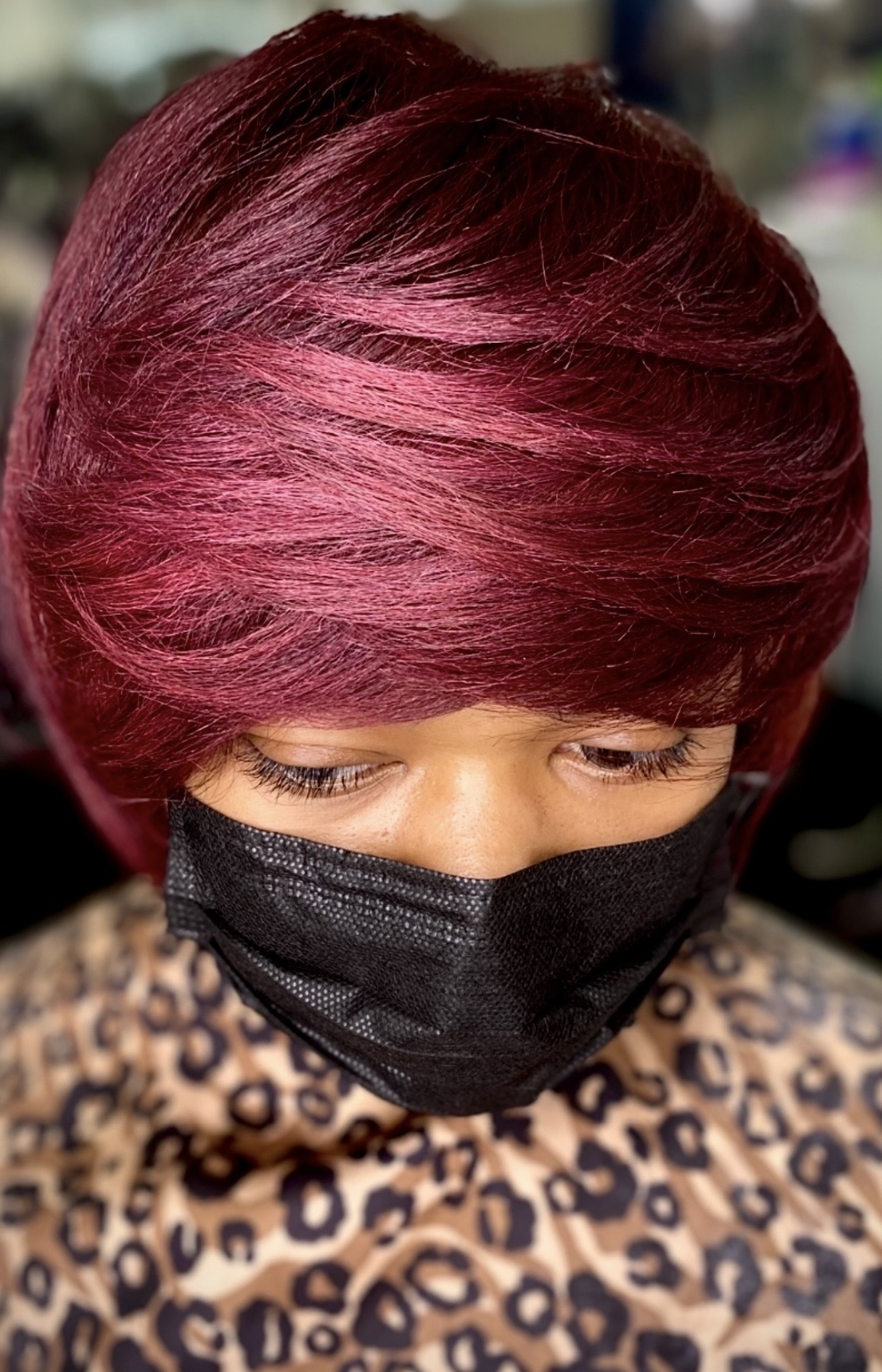 Burgundy sculpted hairstyle by Genetik Bleu Salon