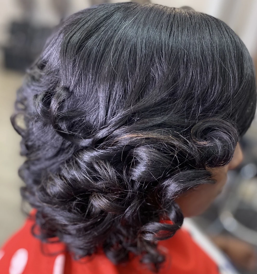Soft black curls hairstyle by Marni