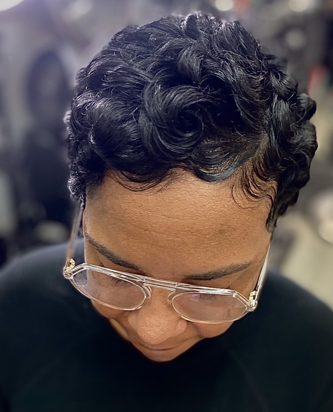 Sculpted short curls at Genetik Bleu Salon