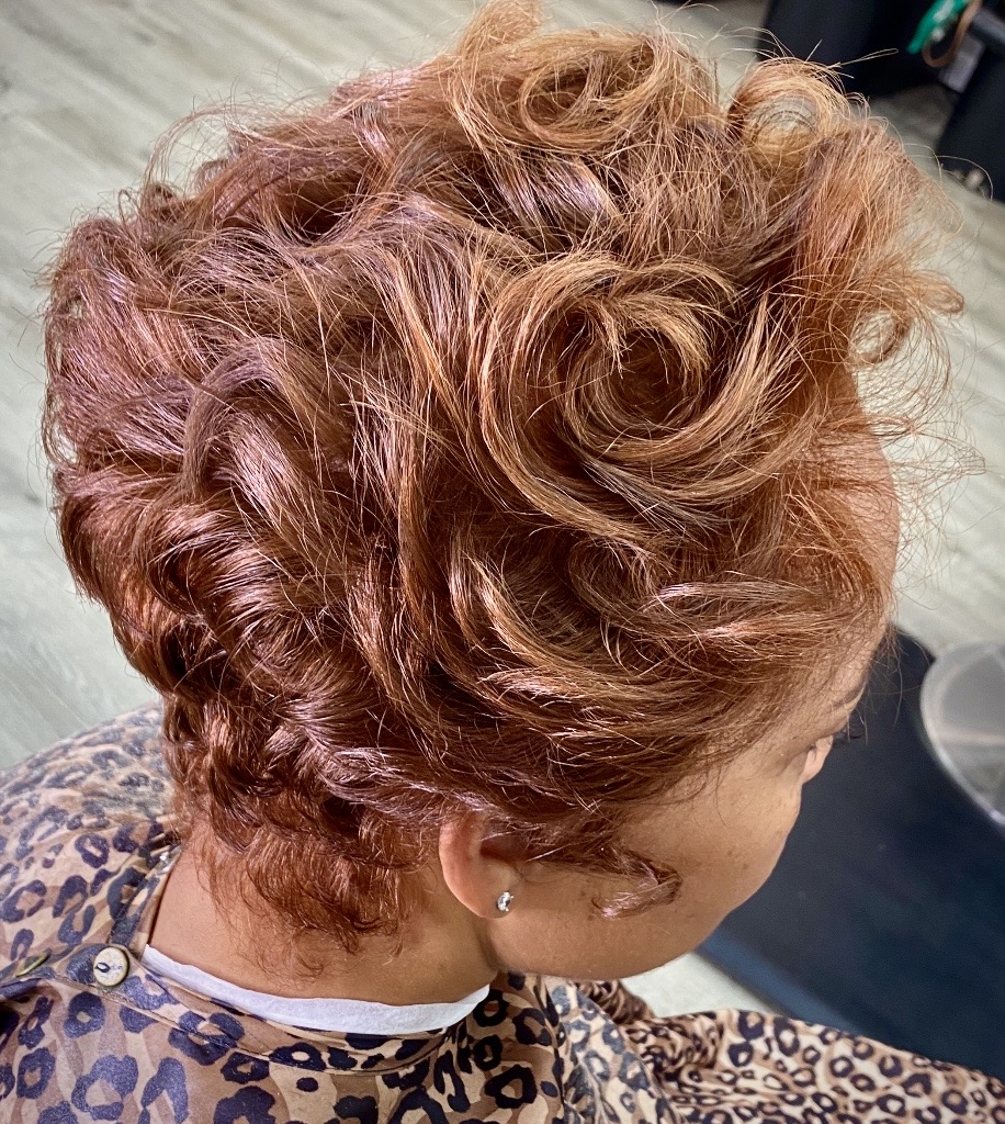 Copper color retouch with sculpted curls by Marni